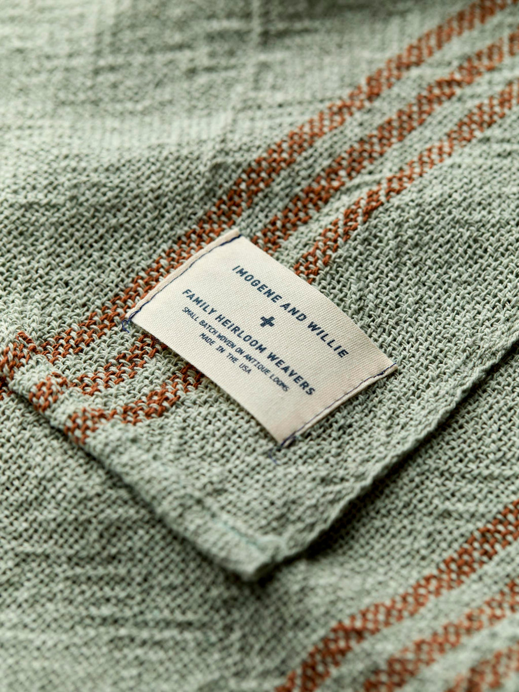 i+w x family heirloom weavers cotton throw in sage stripe